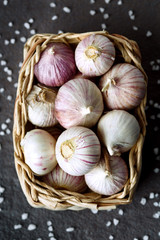 Close-up of basket with ripe garlic
