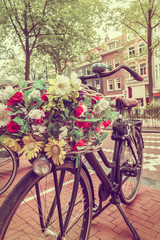Fototapeta na wymiar Retro styled image of a Dutch bicycle in Amsterdam