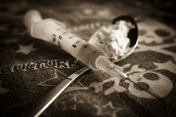 Training spoon, the syringe and cooked heroin. To stop the use of Drugs.Injection, illicit drugs,...