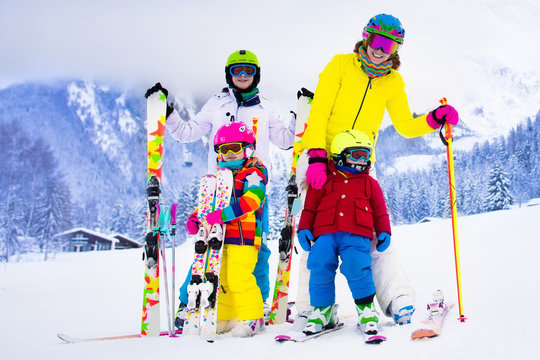 Family with children on winter ski vacation
