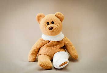 Teddy bear with bandage