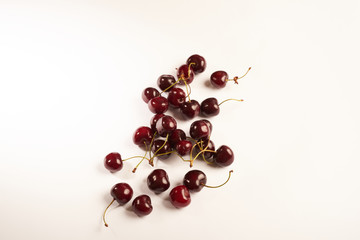 ripe cherries on a white background