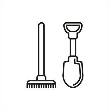 Shovel and rake icon isolated on white background