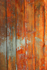 Fototapeta na wymiar Wood plank texture orange color. Background of old panels