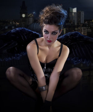 female dark angel with black wings in lingerie