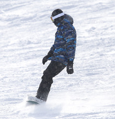 Fototapeta na wymiar people snowboarding on the snow in the winter