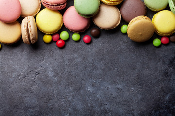 Colorful macaroons and candies. Sweet macarons