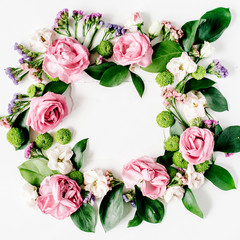 round frame wreath pattern with roses, pink flower buds, branches and leaves isolated on white background. flat lay, top view