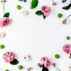 round frame wreath pattern with roses, pink flower buds, branches and leaves isolated on white background. flat lay, top view