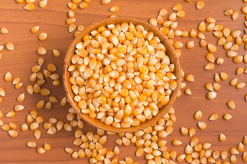Corn into a bowl. PopCorn