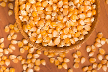 Corn into a bowl. PopCorn