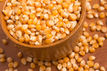 Corn into a bowl. PopCorn