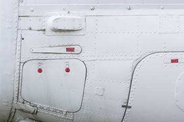 Part of the aircraft, aluminum sheet with rivets and hatch