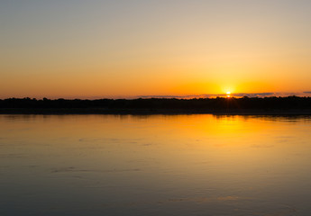 a beautiful sunset on the river