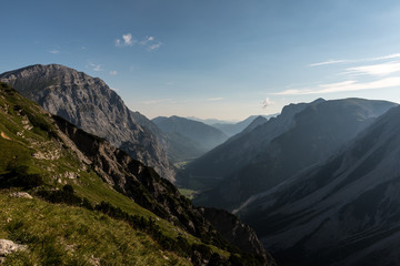 Hiking in the morning hours in the mountains of Austria