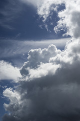 blue sky with stormy rainny clouds