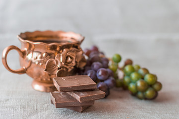 coffee with chocolate and grapes