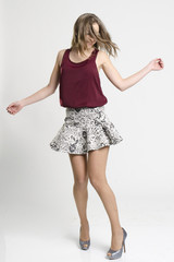 stylish young woman posing in clear background