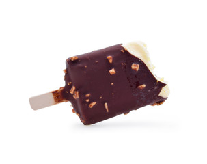Ice cream covered with chocolate white background.