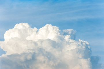 Naklejka na ściany i meble White cumulus congestus clouds on blue sky background.