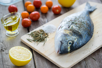 Dorado fish on slate board