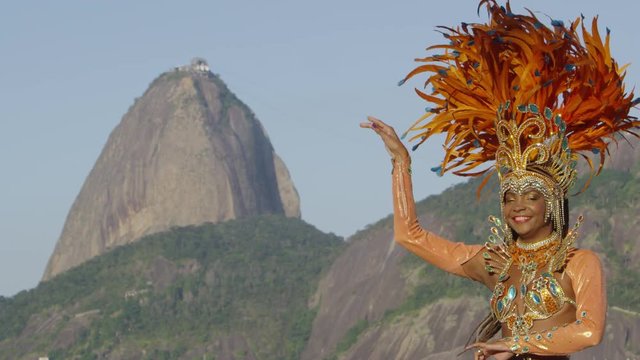 Samba dancing in full costume in Rio de Janiero beach