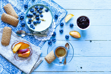Fototapeta na wymiar Healthy Breakfast with blueberries and banana yogurt