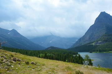 Fototapeta na wymiar Scenic lake among tall mountains in Glacier.