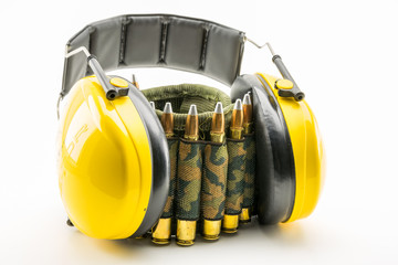 yellow ear protection and camouflage ammunition belt