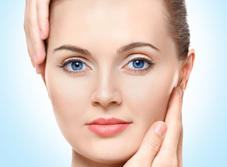 Fototapeta premium Portrait of beautiful girl, on light background. Spa concept
