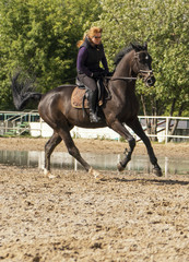 Girl riding a horse