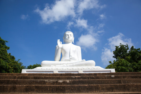 White Buddha statue. Mihintale, Sri Lanka