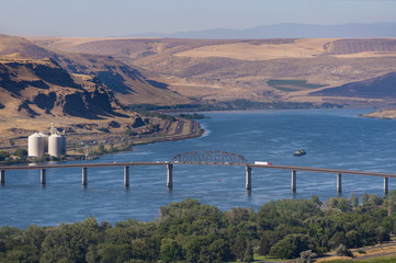The Sam Hill Memorial Bridge. This is a steel truss bridge that carries U.S. Route 97 across the Columbia River between Biggs Junction, Oregon in Sherman County and Maryhill, Washington.