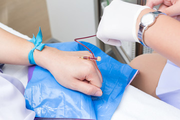 IV solution in a patient hand