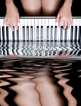 female hands playing piano with water reflection, concept : music was originated from nature
