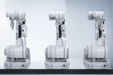 robotic arms with empty conveyor belt