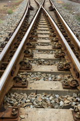 Two railway tracks merge