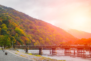 Fototapeta na wymiar Togetsukyo Bridge or Moon Crossing Bridge Beautiful travel landmark in Arashiyama, Kyoto Japan.
