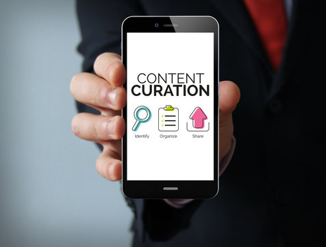 Content curation graphic on the screen businessman smartphone