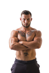 Handsome shirtless muscular man, standing, isolated on white background in studio shot