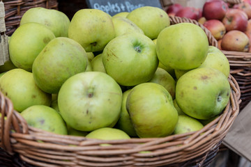 Closeup of green Apples sold at Borough Market in London, UK