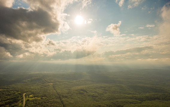 Aerial Photos. The sun's rays make their way through the clouds.