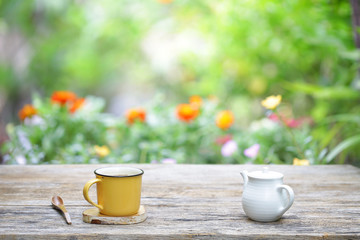 white vintage  teapot  with yellow mug