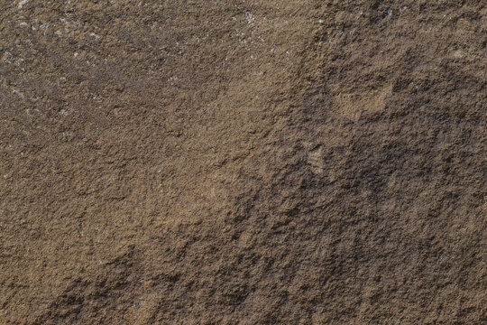 Sandstone texture.
Brown rough stone. The surface is uneven.