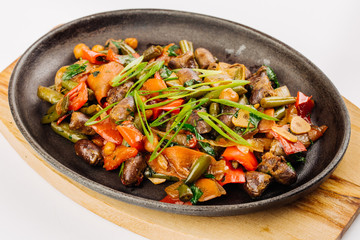 Fried chicken hearts with vegetables