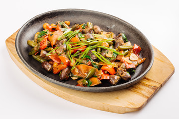 Fried chicken hearts with vegetables