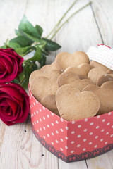 Festive cookies with hearts and roses for Valentine's Day.