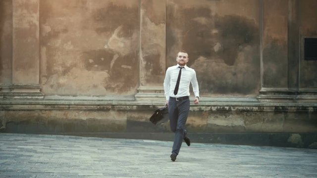 business man jump and run with slow motion