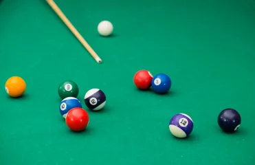 Foto op Plexiglas Billiard table with balls. Close-up. Narrow depth of field © smspsy