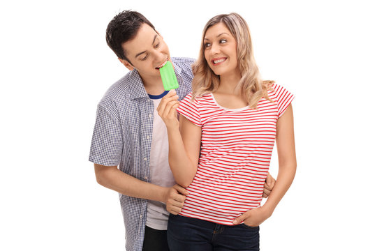 Young Couple Sharing An Ice Cream